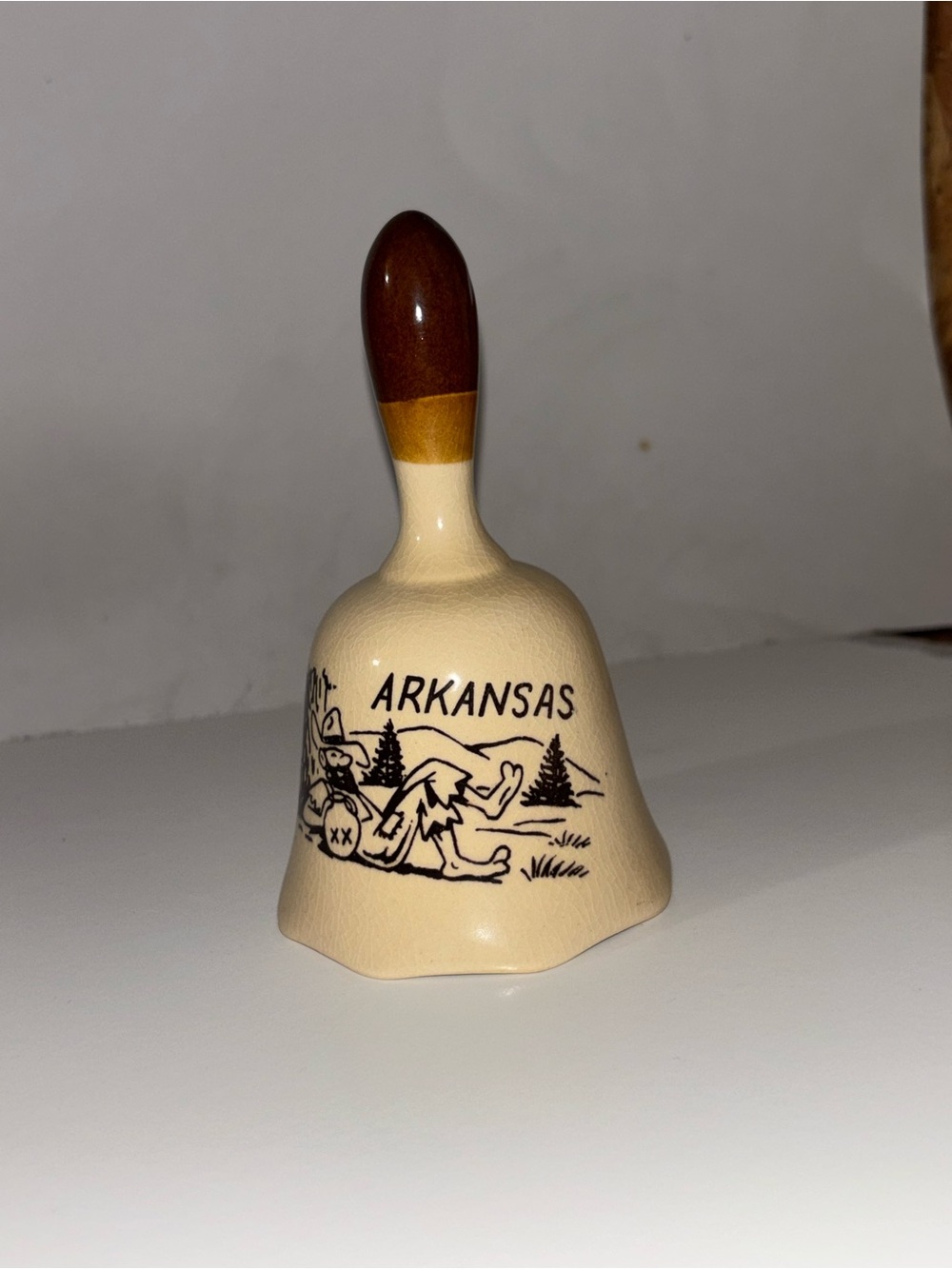 Arkansas Ceramic Souvenir Bell with Brown Handle
